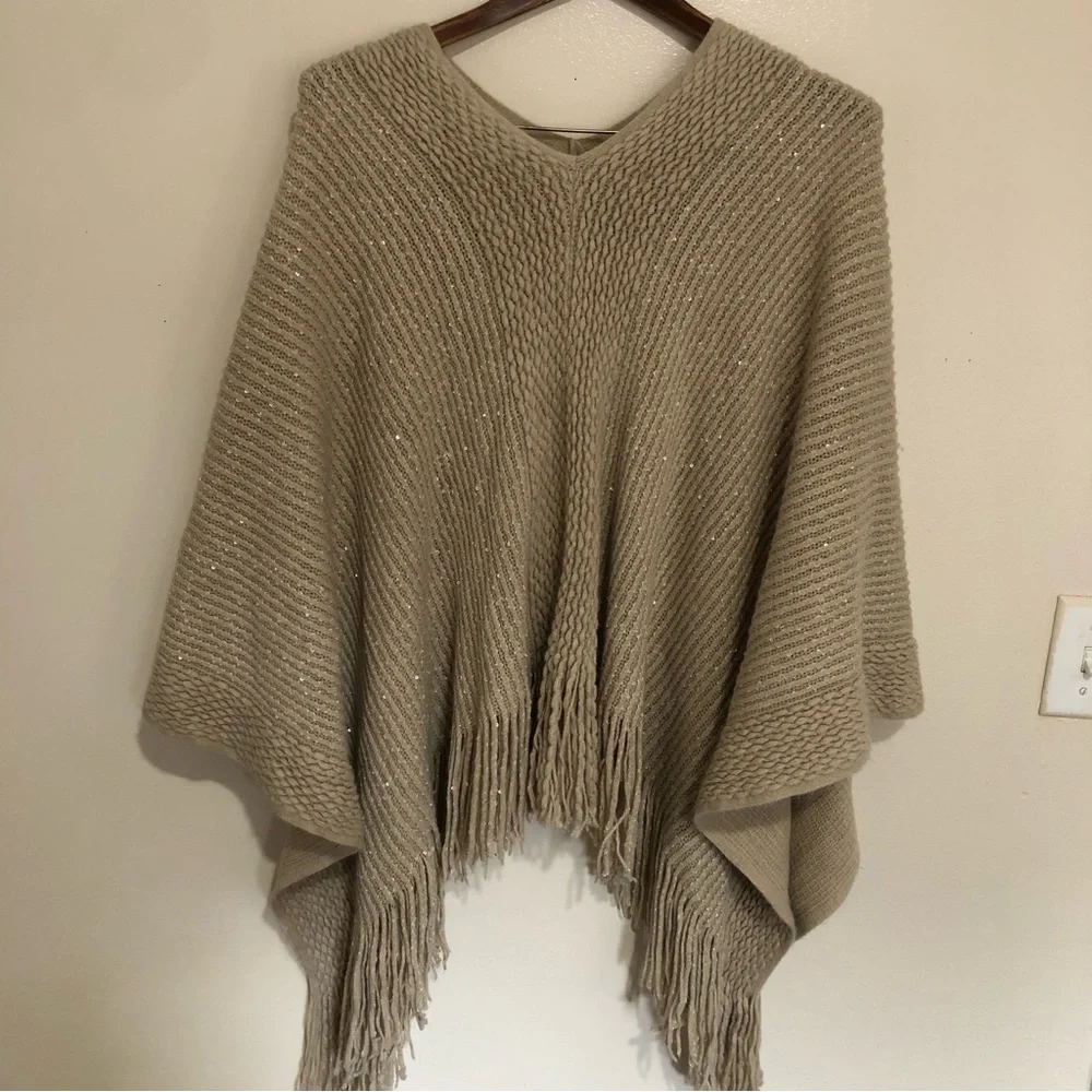 Tan knitted metallic gold fringe hem poncho
